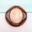 Picture of 1930'S Root Beer & Apple Juice Carved Bakelite Pendant With Celluloid Cameo Center