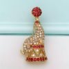 Picture of Vintage Napier Pave Circus Seal With Ball Brooch In Red & Clear Rhinestones