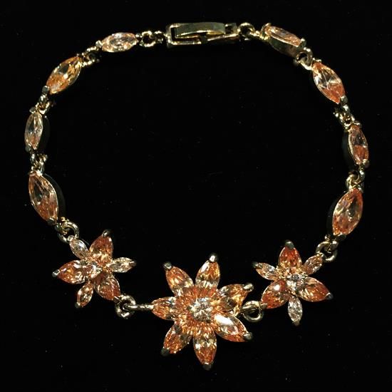 Picture of Qsi Bracelets -,topaz Cz Flower Bracelet In Gold Tone Metal. 7.25" Long.