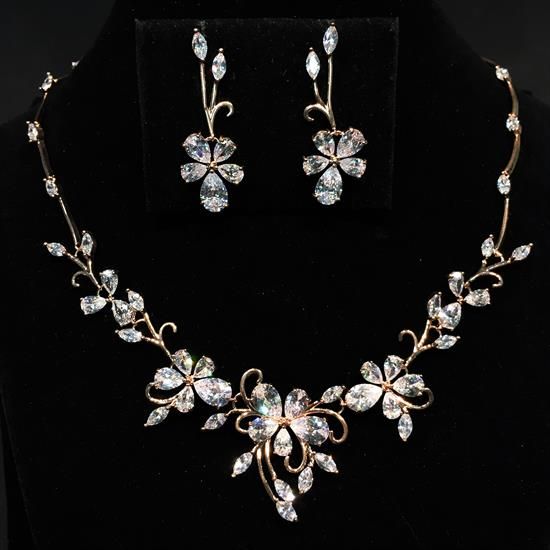 Picture of Qsi Sets -,clear Cz & Rose Gold Tone Metal Floral Necklace & Post Back Earring Set. 17.5" Necklace, 1.25" Wide At Center. 1.5" Long Earrings