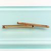 Picture of Edwardian Era Pair Of 14K Yellow Gold, Seed Pearl & White Enamel Bar Brooches