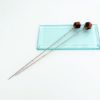 Picture of Pair Of 1930'S Butterscotch & Black Facted Bakelite Hat Pins