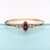 Picture of Victorian Era 15K Gold, Diamond, Natural Seed Pearl & Red Guilloche Enamel Hinged Bangle Bracelet