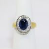 Picture of 18K Yellow Gold Oval Sapphire & Diamond Accented Ring