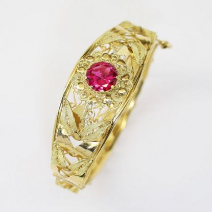 Picture of 18K Yellow Gold Hinged Bangle Bracelet with Solitaire Synthetic Ruby Accent 