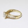 Picture of 14K Yellow Gold, Round Brilliant Cut & Diamond Cluster Accented Two-Piece Bridal Ring Set