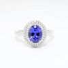 Picture of Platinum & 2.5ct Tanzanite Ring with .54ct Diamond Halo