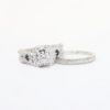 Picture of 14k White Gold, Round Brilliant Cut Diamond Halo & Sapphire Accented Two-Piece Bridal Ring Set