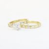 Picture of 14k Yellow Gold, Triangle Cut & Diamond Cluster Accented Two-Piece Bridal Ring Set