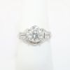 Picture of Platinum, Round Brilliant Cut & Diamond Cluster Accented Engagement Ring