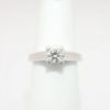 Picture of Platinum, Round Brilliant Cut & Diamond Cluster Accented Engagement Ring