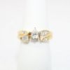 Picture of 14K Yellow Gold, Pear Brilliant Cut Diamond Solitaire & Diamond Cluster Accented Two-Piece Bridal Ring Set