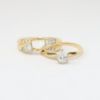 Picture of 14K Yellow Gold, Pear Brilliant Cut Diamond Solitaire & Diamond Cluster Accented Two-Piece Bridal Ring Set