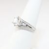 Picture of Platinum, Round Brilliant Cut & Diamond Cluster Accented Engagement Ring