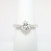 Picture of 18k White Gold, Round Brilliant Cut & Diamond Cluster Accented Engagement Ring