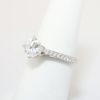 Picture of 18k White Gold, Round Brilliant Cut & Diamond Cluster Accented Engagement Ring