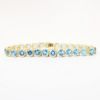 Picture of Blue Topaz Tennis Bracelet, 14k Yellow Gold