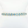 Picture of Blue Topaz Tennis Bracelet, 14k Yellow Gold