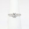 Picture of 18k White Gold, Round Brilliant Cut & Diamond Cluster Accented Engagement Ring