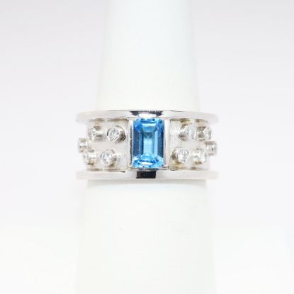 Picture of 1.25ct Emerald Cut Blue Topaz Ring, 0.30 Diamond Accents, 14k White Gold