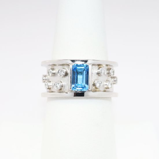 Picture of 1.25ct Emerald Cut Blue Topaz Ring, 0.30 Diamond Accents, 14k White Gold