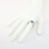 Picture of 1.25ct Emerald Cut Blue Topaz Ring, 0.30 Diamond Accents, 14k White Gold