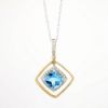 Picture of 14k Two-Tone Gold & 1.75ct Blue Topaz Pendant Necklace with Diamond Halo