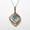 Picture of 14k Two-Tone Gold & 1.75ct Blue Topaz Pendant Necklace with Diamond Halo