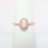 Picture of 14k Rose Gold, Opal and Diamond Halo Ring