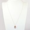 Picture of 14k Rose Gold & 2.00ct Oval Cut Morganite Pendant Necklace with Diamond and Garnet Halo