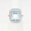 Picture of 14k White Gold & 4.32ct Emerald Cut Aquamarine Ring with Diamond Halo