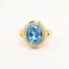 Picture of 18k Yellow Gold & Bezel Set Oval Cut Blue Topaz Ring