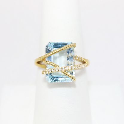 Picture of 14k Yellow Gold & Emerald Cut Blue Topaz Ring with Diamond Accents