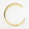 Picture of 'Atlas' Roman Numeral Cuff Bracelet by Tiffany & Co. in 18k Yellow Gold