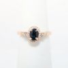 Picture of 14k Rose Gold, Oval Cut Sapphire and Diamond Halo Ring