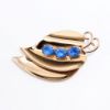 Picture of Vintage 1940's Coro Rose Gold Gilt Sterling Silver & Blue Rhinestone Leaf Shaped Fur Clip