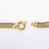 Picture of Tri-Colored 18k Gold Triple Strand Necklace with Gold Bead Accents
