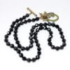 Picture of Heidi Daus 'Perennial Favorite' Black Beaded with Pavé Crystal Flower Toggle Closure Necklace