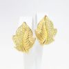 Picture of Vintage Signed Christian Dior Gold Tone Leaf Earrings with Yellow Rhinestones