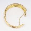 Picture of 18k Yellow Gold Coiled Snake Hinged Bangle Bracelet with Ruby Eyes