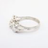 Picture of 14k White Gold Textured Levels Ring with Three Diamond Accents