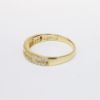 Picture of 14k Yellow Gold, Baguette & Round Brilliant Cut Diamond Wedding Band