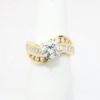 Picture of 14k Yellow Gold & 1.00ct Diamond Solitaire Ring with Baguette Cut Accents