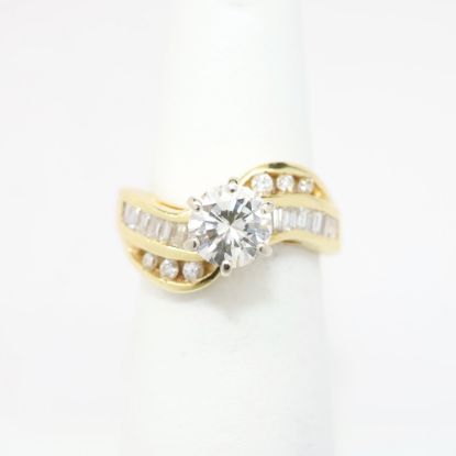 Picture of 14k Yellow Gold & 1.00ct Diamond Solitaire Ring with Baguette Cut Accents