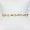 Picture of 10k Two-Tone Textured Gold Dolphin Link Bracelet