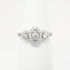 Picture of 14k White Gold & Triple Diamond Ring with Halo Accents