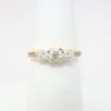 Picture of 14k Yellow Gold Triple Diamond Bridal Ring wit Heart Details on Band