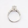 Picture of 14k White Gold & Round Brilliant Cut Diamond Solitaire Ring with Baguette Cut Accents