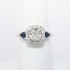 Picture of 18k White Gold & Cushion Cut Diamond Halo Ring with Blue Sapphire Accents