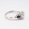 Picture of 18k White Gold & Cushion Cut Diamond Halo Ring with Blue Sapphire Accents